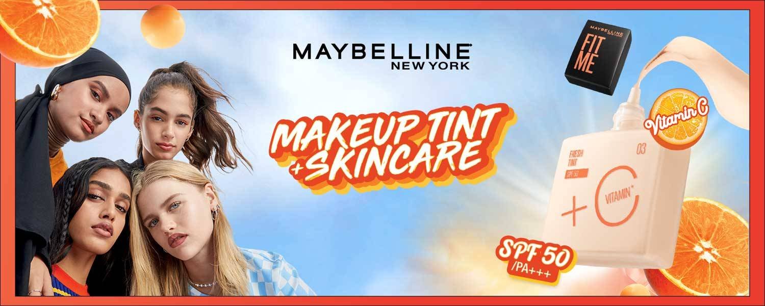 Woman applying Easy Eraser Maybelline product